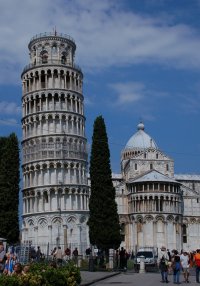 Tower with leaning cypresses